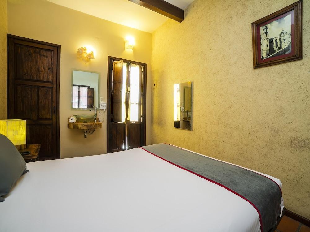 Collection O Al Otro Lado Del Rio, Puebla Hotel Exterior photo A room at the hotel