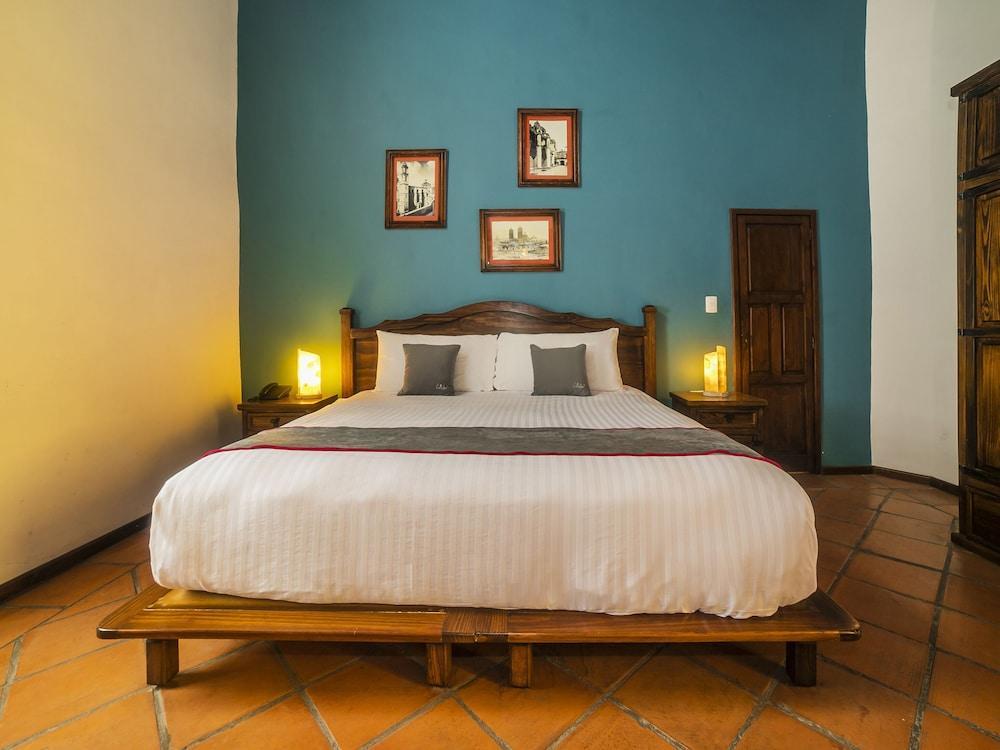 Collection O Al Otro Lado Del Rio, Puebla Hotel Exterior photo A bedroom at the hotel