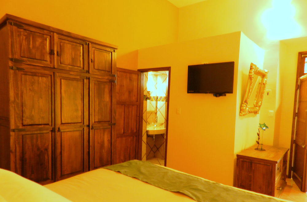 Collection O Al Otro Lado Del Rio, Puebla Hotel Exterior photo A room at the hotel