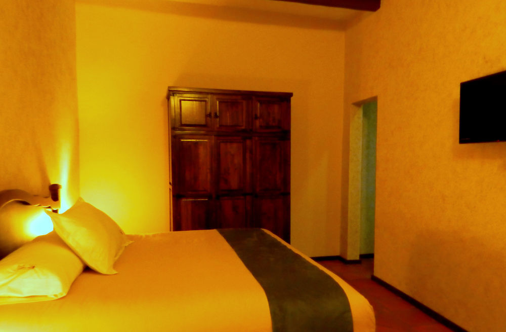 Collection O Al Otro Lado Del Rio, Puebla Hotel Exterior photo A room at the hotel