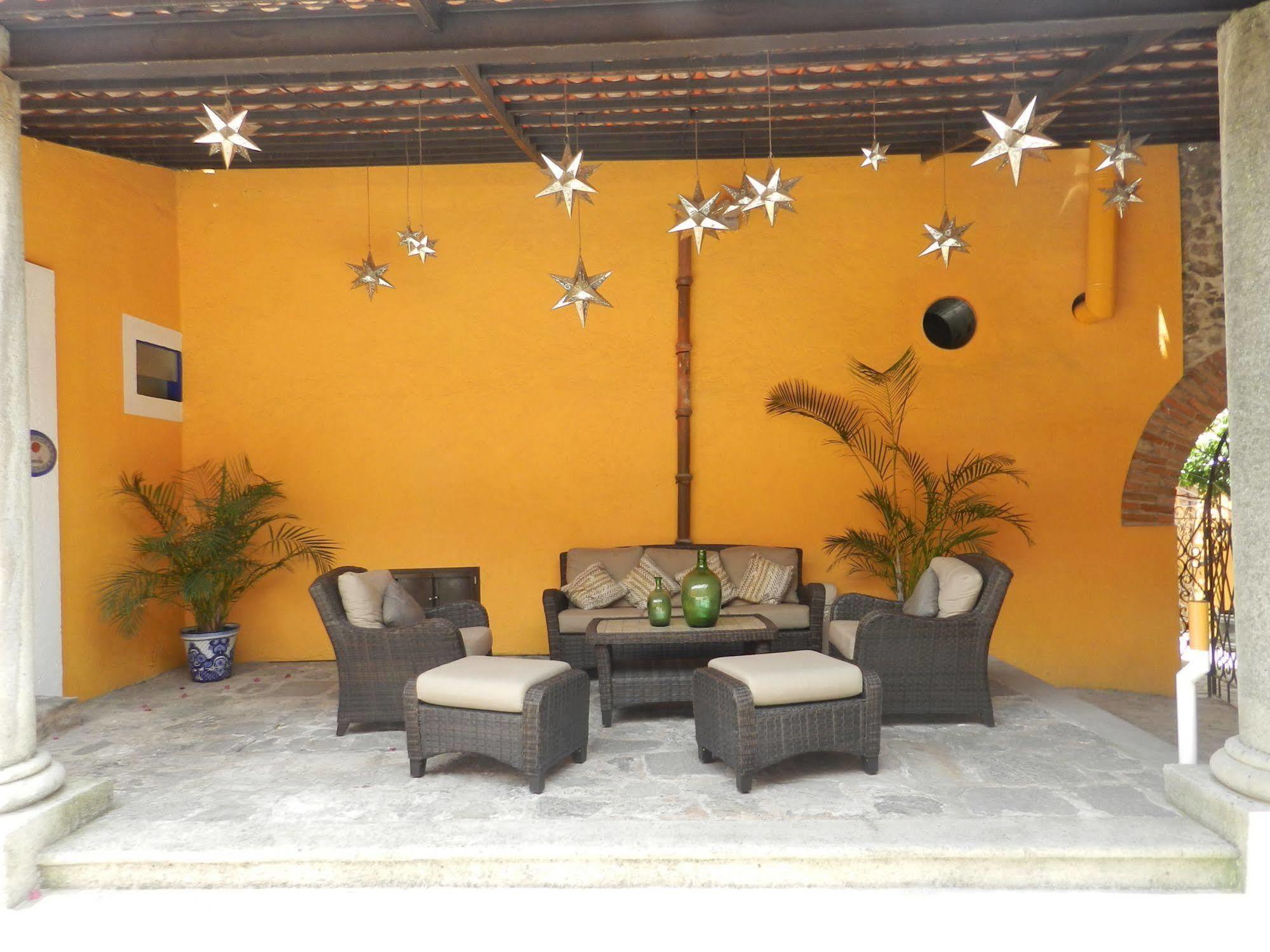 Collection O Al Otro Lado Del Rio, Puebla Hotel Exterior photo Interior of a typical house in San Cristóbal de Las Casas