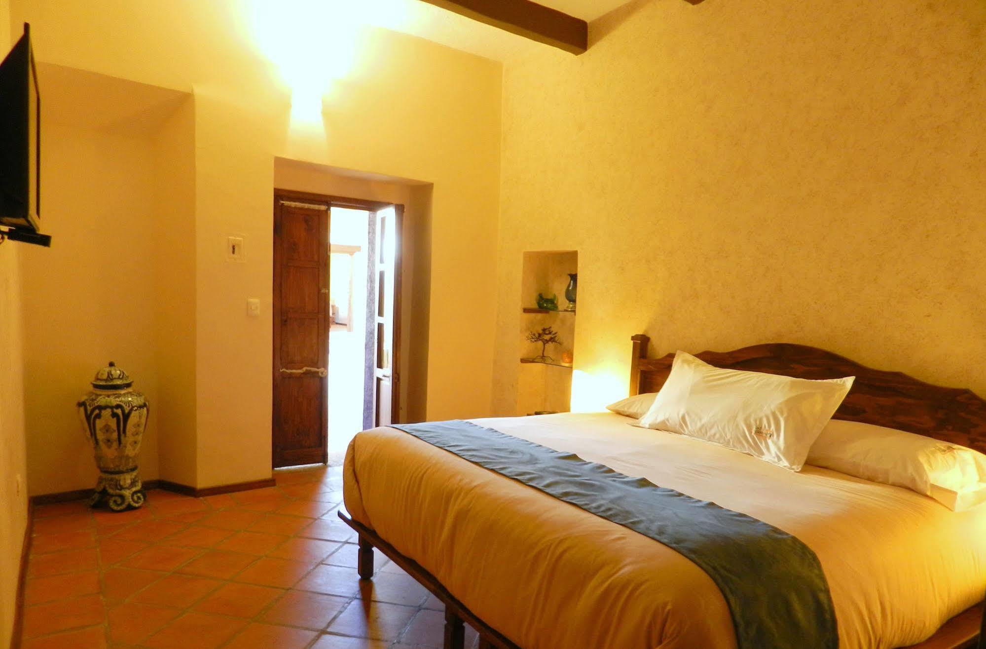 Collection O Al Otro Lado Del Rio, Puebla Hotel Exterior photo A room at the hotel