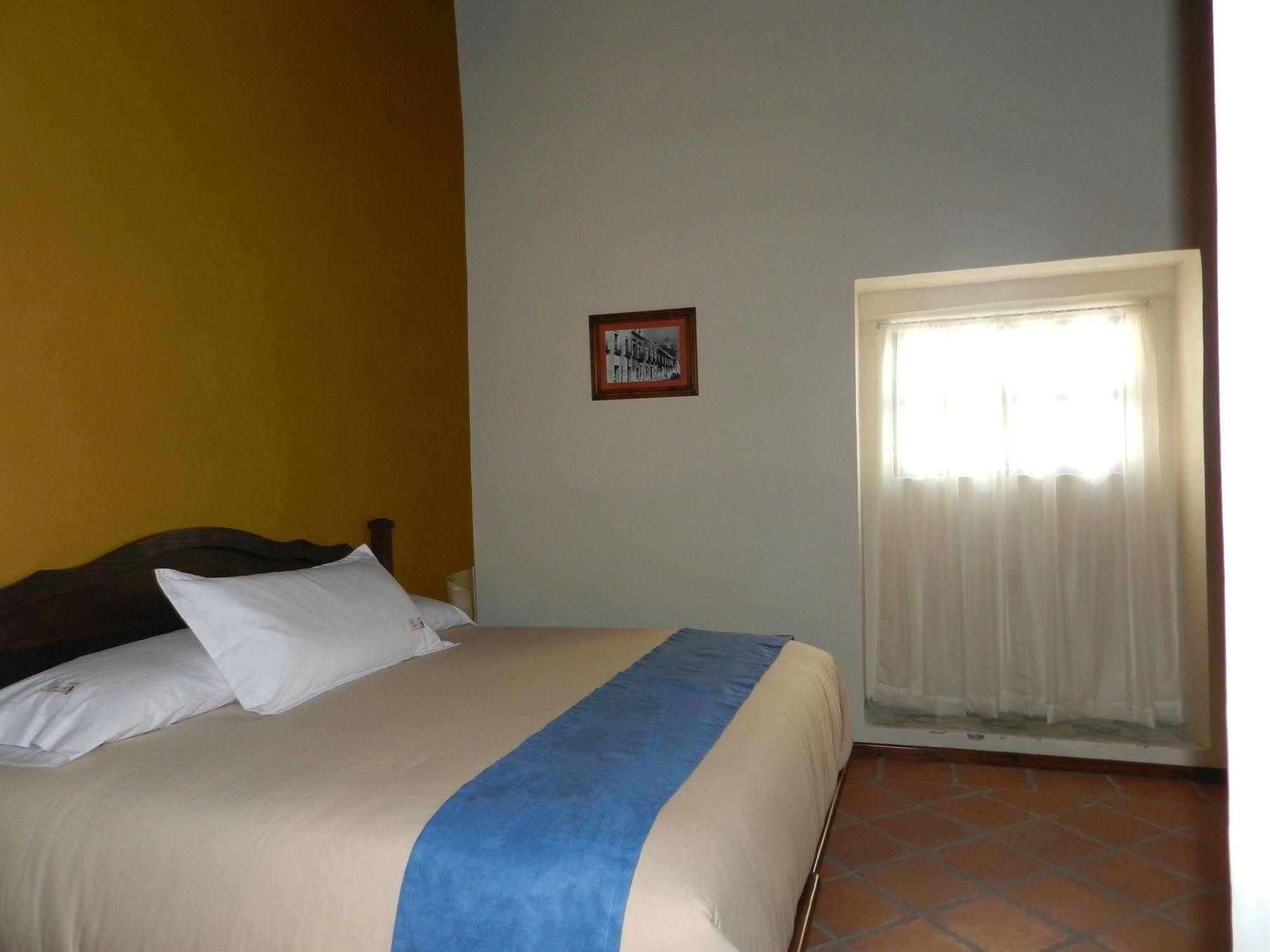 Collection O Al Otro Lado Del Rio, Puebla Hotel Exterior photo A room at the hotel