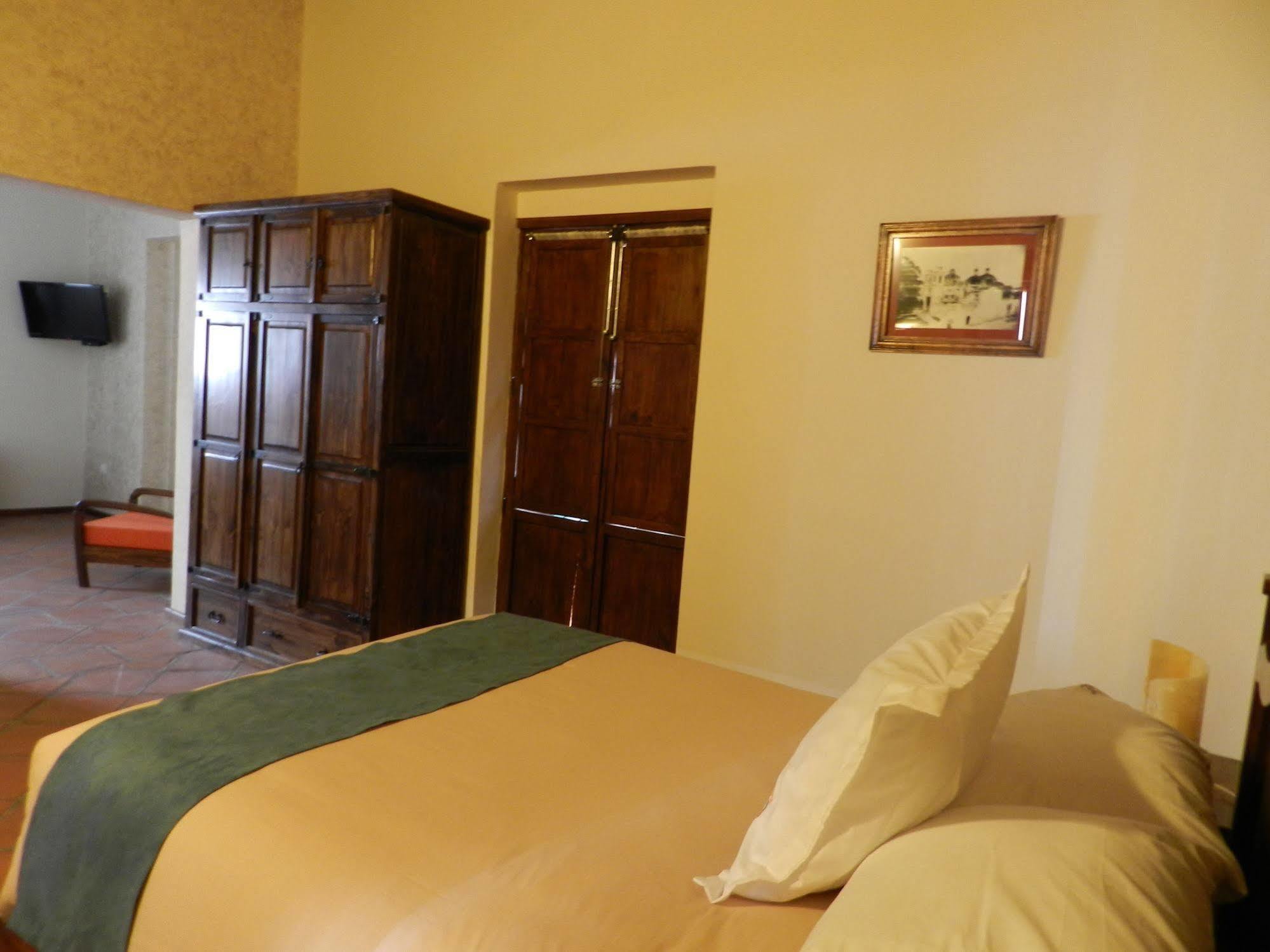 Collection O Al Otro Lado Del Rio, Puebla Hotel Exterior photo A room at the hotel