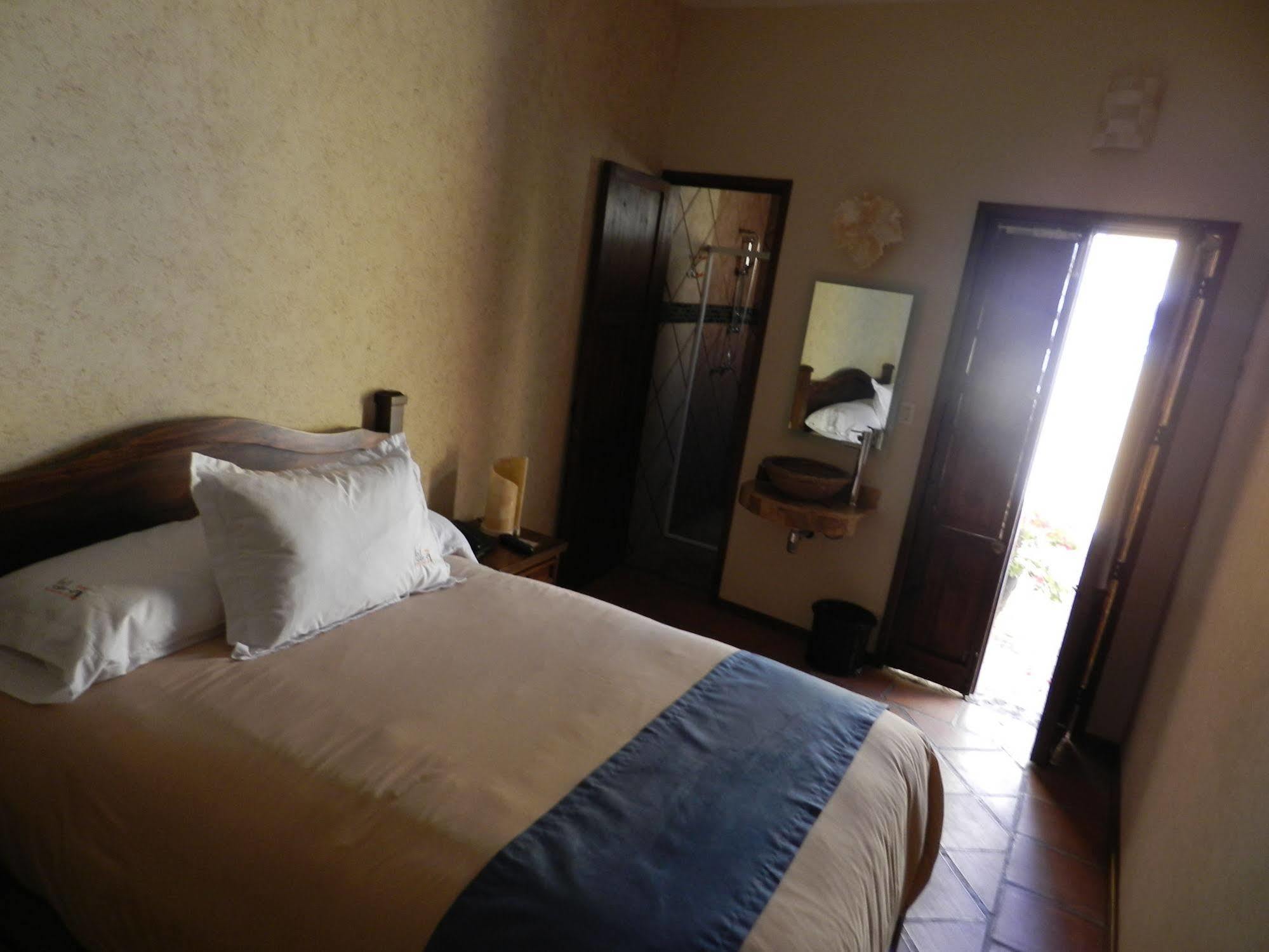 Collection O Al Otro Lado Del Rio, Puebla Hotel Exterior photo A room at the hotel