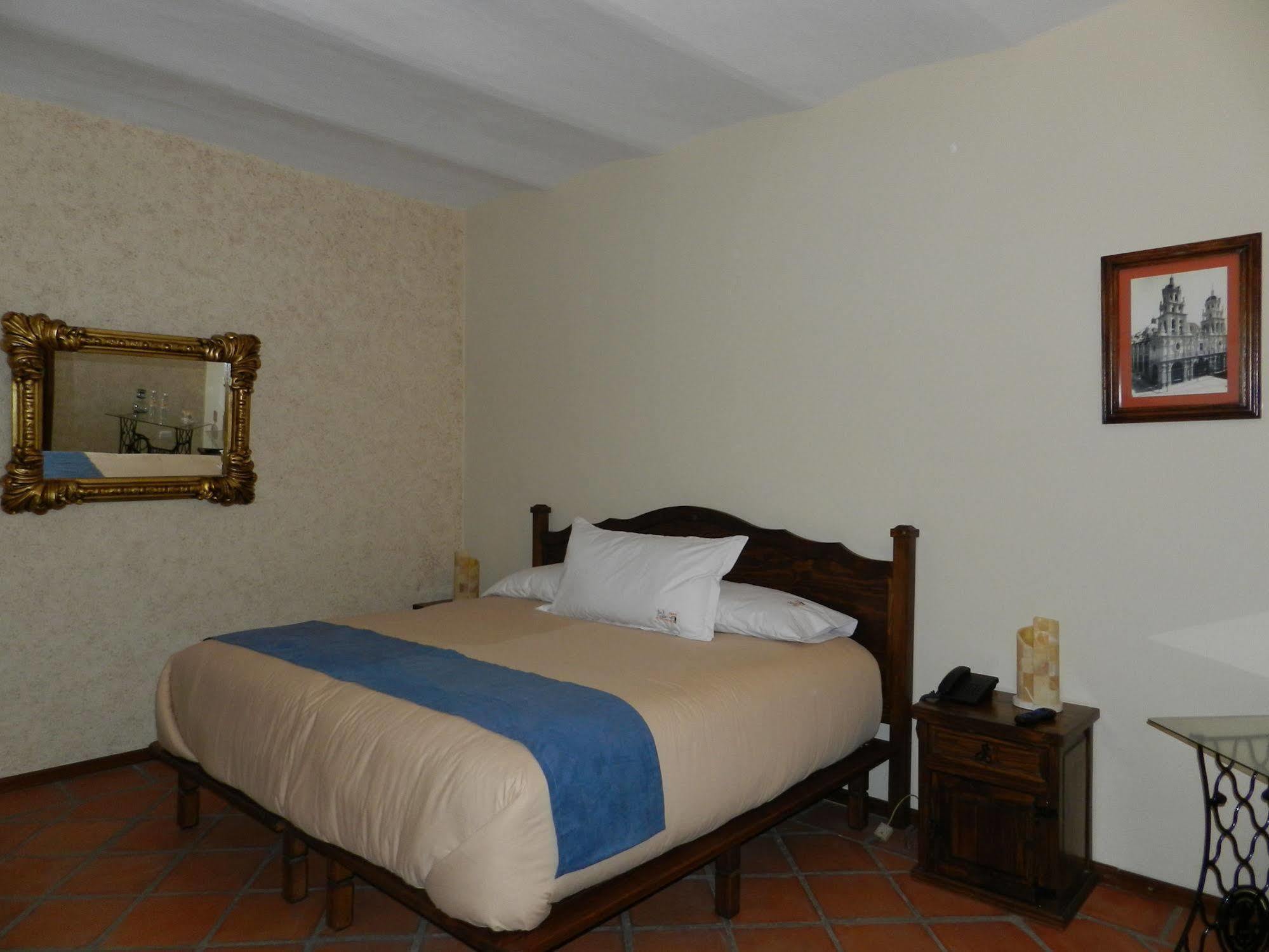 Collection O Al Otro Lado Del Rio, Puebla Hotel Exterior photo A room at the hotel