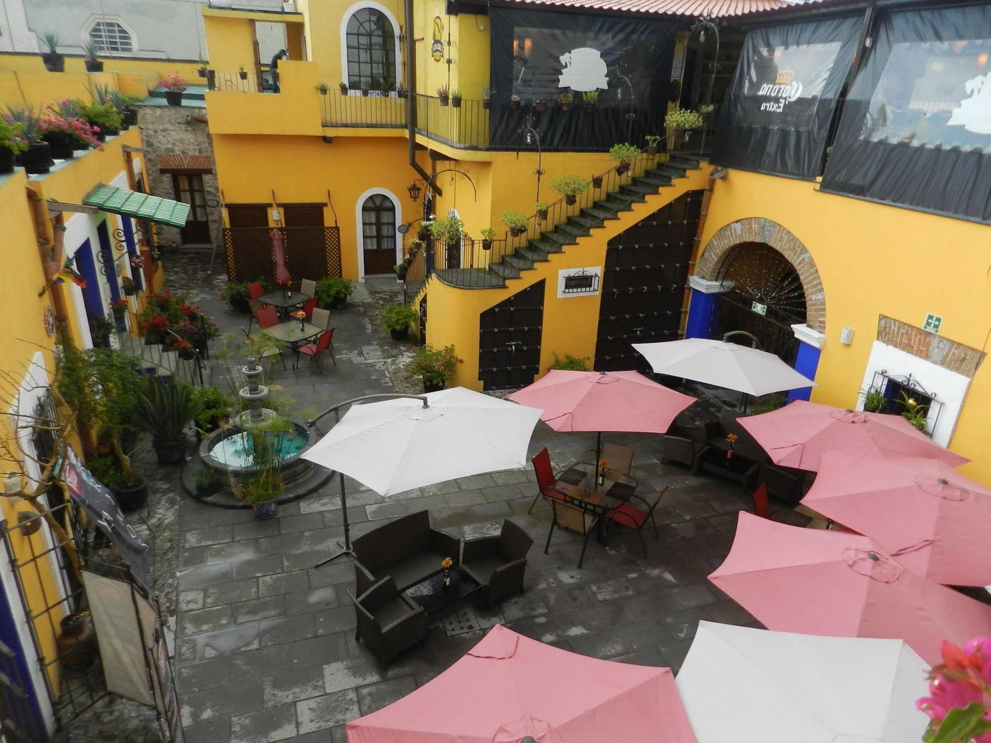 Collection O Al Otro Lado Del Rio, Puebla Hotel Exterior photo Patio of the restaurant