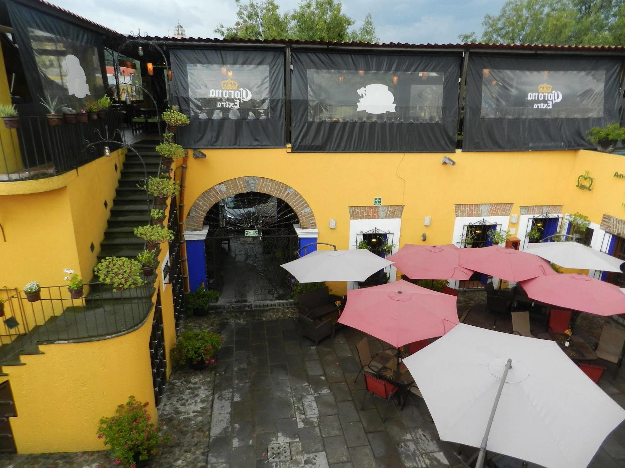 Collection O Al Otro Lado Del Rio, Puebla Hotel Exterior photo The restaurant's patio