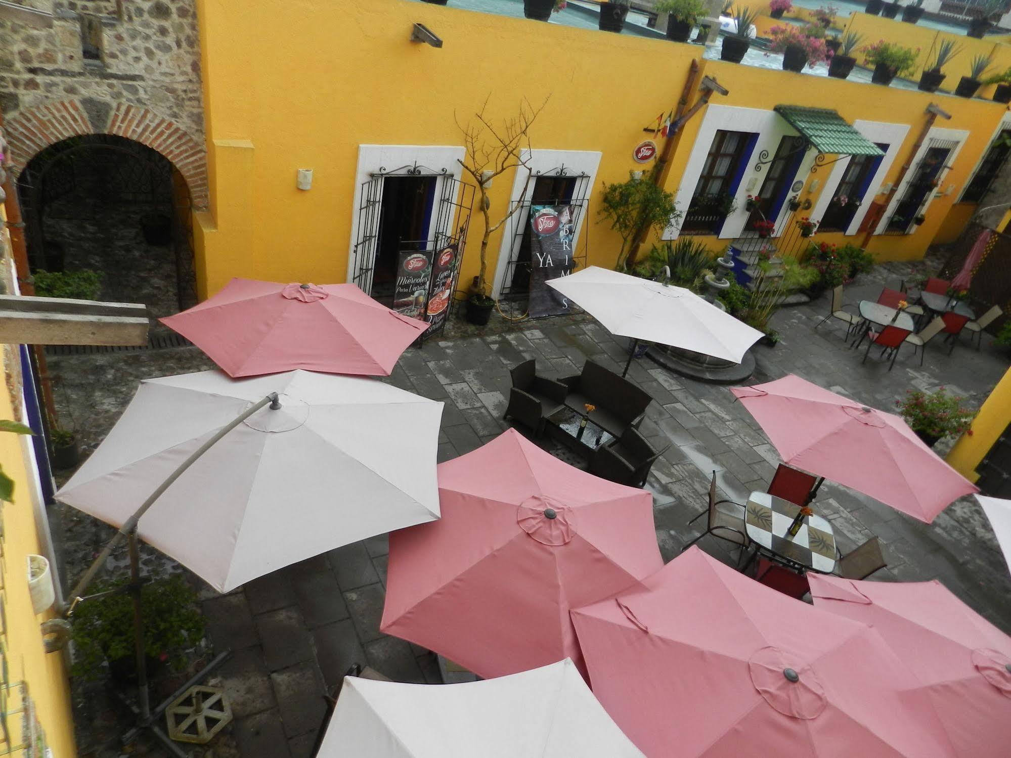 Collection O Al Otro Lado Del Rio, Puebla Hotel Exterior photo Patio of the Casa de Morelos